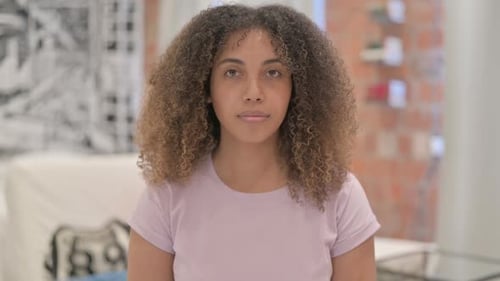 Close up portrait of woman with curly hair