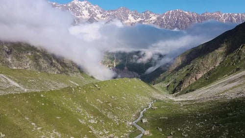 Fantastic Mountain Scenery of Snowcovered Alpine Peaks Aerial View
