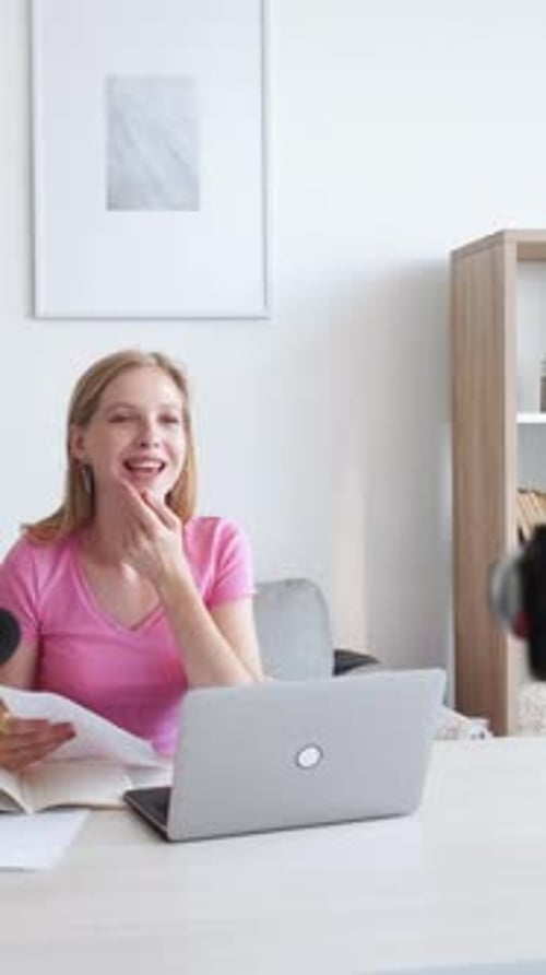 Woman Video Calling with Papers at Home