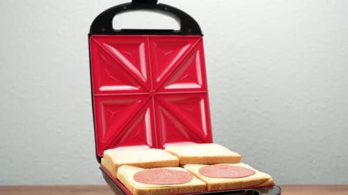 Open Sandwich Maker with White Bread and Cheese