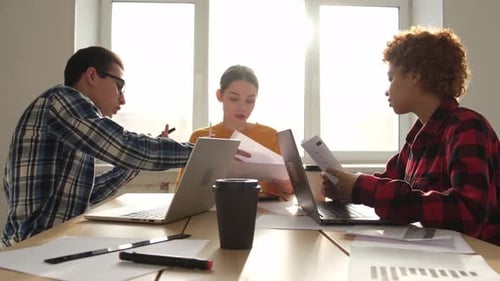 Team at Work Office Meeting Group of Young Business People Working Together in Creative Office Happy