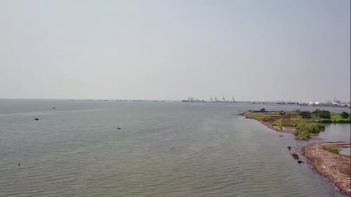 Drone shot of Baruna beach located in North Semarang, Central Java, Indonesia