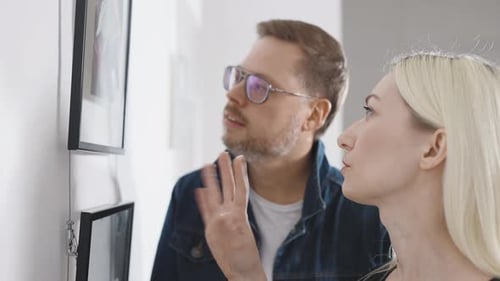 A Man and a Woman Visited a Modern Art Gallery