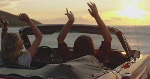 Friends, road trip and sunset at the sea in a car with drive for holiday