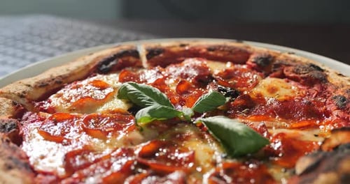 Delicious Pepperoni Pizza With Cheese and Basil