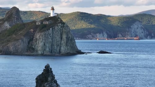 Lighthouse on Large Body of Water
