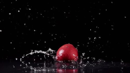 Crisp Apple Falls in Water, Macro Shot