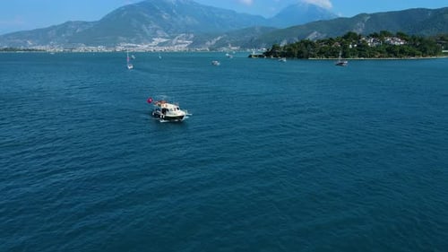 Beautiful view of the beach with boats, pure nature, sea and ships. Shot from a drone.