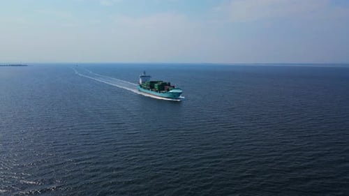 Cargo Container Ship Cruising in Sea to Cargo Port