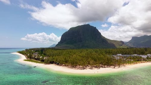 Mauritius Paradise with White Sandy Beach and Iconic Mountain Backdrop Aerial View