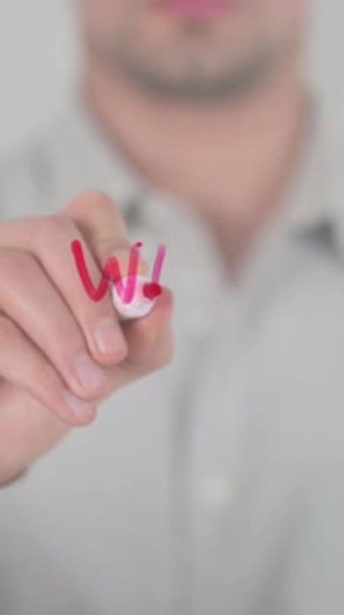 Writing Web Pirate on Transparent Glass with Marker