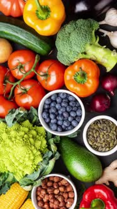 Vibrant Overhead Display of Fresh Produce and Nuts
