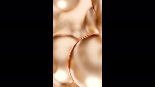 Fluid Golden Spheres Abstract Vertical Background Animation