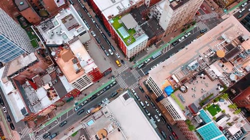 Busy crossroads in one of the districts of modern metropolis. Traffic jams the streets of New York