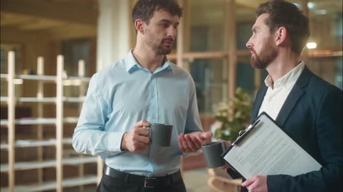 Caucasian Men Conversation Friendly Talking in Office Break Coffee Drinking Together Business Guys