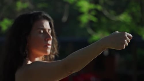 Woman doing Spanish dance moves with her hand