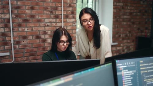 Female Frontend Developer and Data Scientists Working in Office of ITcompany Designer of Website