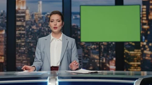 Presenter Showing Mockup Screen Reporting Breaking News in Tv Channel Studio