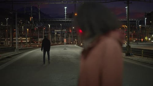 Woman Outdoors at Night Feeling Worried