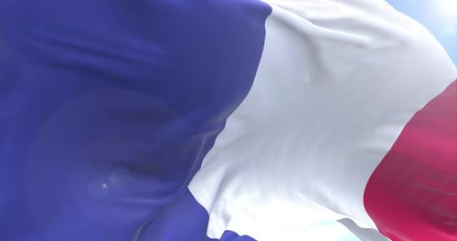 Realistic French Flag Waving in Blue Sky