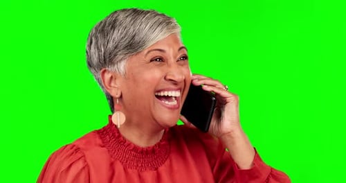 Phone call, happy and senior woman on green screen for conversation, chatting and discussion