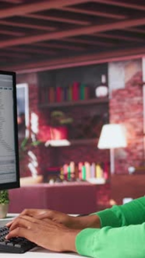 Hands Typing Code then Listens to Headphones