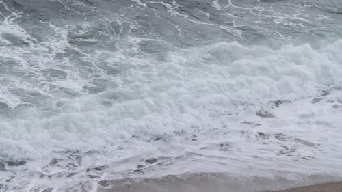 Ocean Waves Crashing on Sandy Beach
