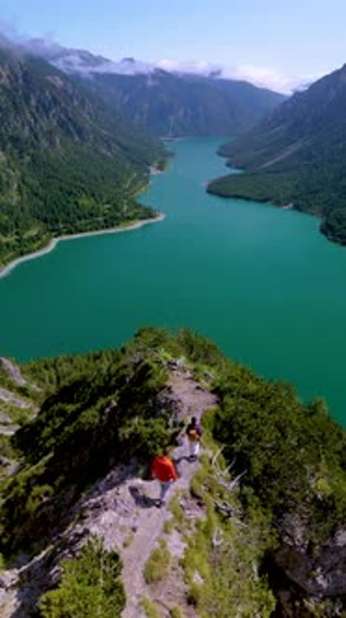 Plansee Austria Breathtaking View of Majestic Mountains Overlooking a Serene Tranquil Lake