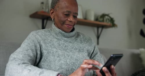 Black woman, elderly and cellphone and typing, chat and communication with social media at home