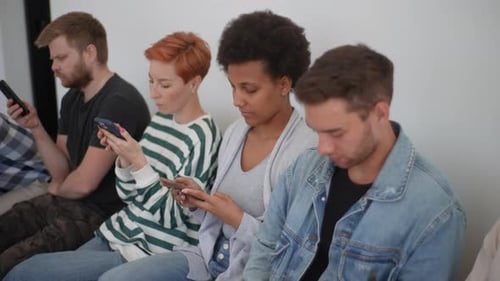 Highangle View Tracking Shot of Bored Multicultural and Different Ages People in Casual Clothes