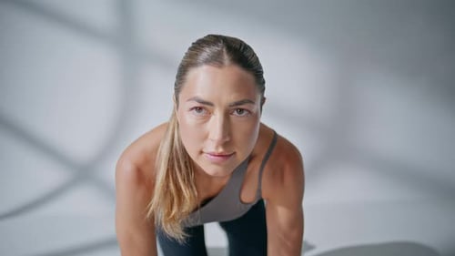 Woman Performing Glute Exercise on Mat