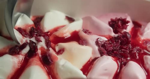 Scooping Ice Cream Berry Sauce and Cherries Top View Spoon Ice Cream Texture with Berry Sauce and
