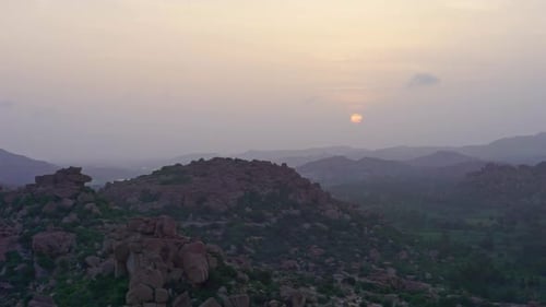 Sunrise timelapse over rocky landscape in Hampi India