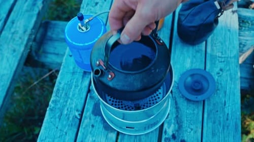 Camp Stove on Wooden Table Top View