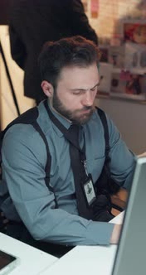 Detective, man and typing on computer in office for online surveillance, evidence report or night