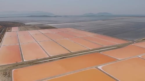 Aerial View Above Red Salt Production Pools in Albania Drone Shot