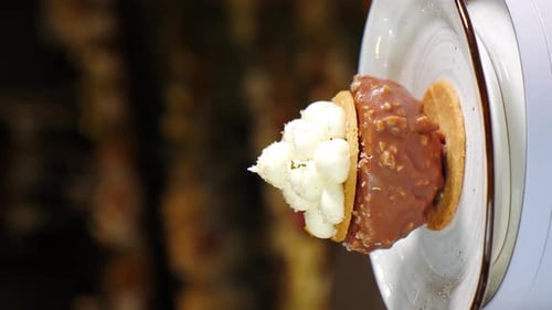 Chocolate Cake with Icing Rotating on Stand Dark Background Sweets and Desserts Vertical Footage