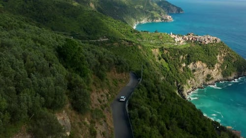 Car traveling towards Corniglia, Cinque Terre, Italy. Aerial View