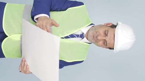 Vertical video of Engineer who doesn't like the project.