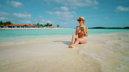 Calmness and Solitude in Amazing Tropical Island in Summer Woman Tanning Fascinating Scenery in