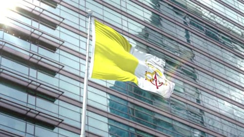 Vatican City Flag Waving in Wind Against Modern Building