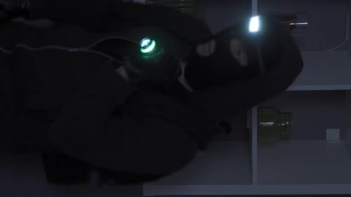 Masked Intruder Searching Home in the Dark