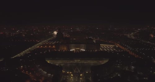 Aerial view of hundreds of fireworks exploding over the city of Bucharest, Bucuresti