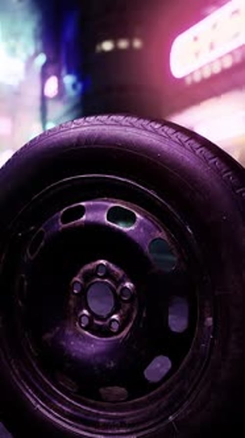 A Close Up of a Tire on a City Street