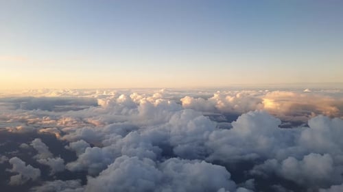 Clouds during sunset flying over Netherlands