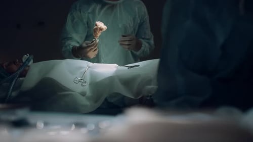Professional Surgeon Begin Surgical Operation In Dark Hospital Emergency Room. Confident African ...