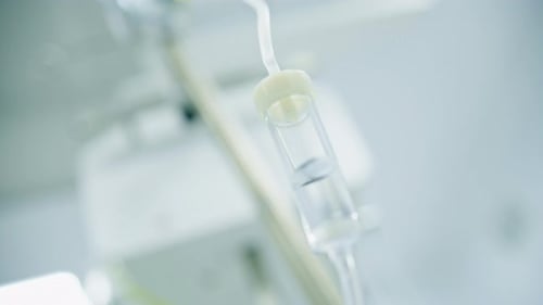Intravenous saline bag in the operating room before the start of a surgical procedure in a clinic