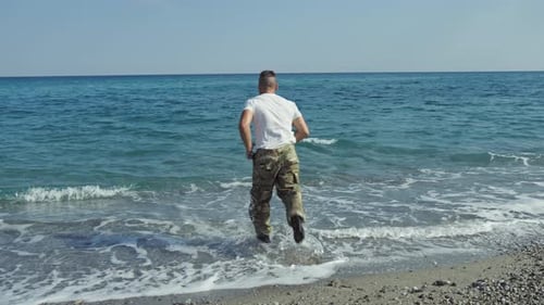 Soldier Dives Into the Sea