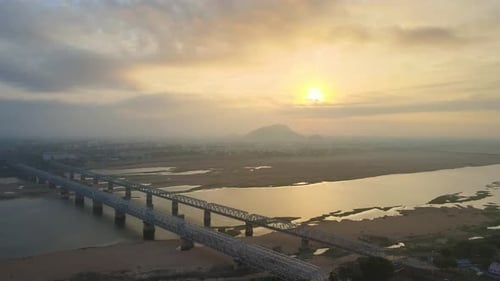Majestic aerial drone shot of Vijayawada city during sunrise
