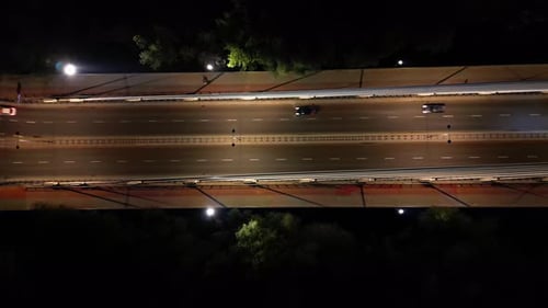 Aerial panoramic shot of Warsaw cityscape. Swietokrzyski suspension bridge over Vistula river, skysc